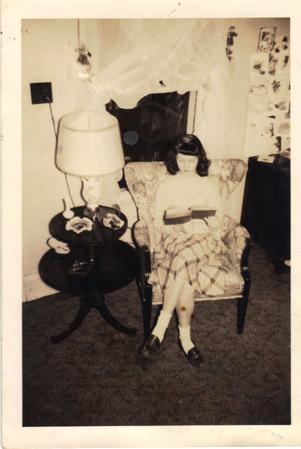 old photo of woman on chair